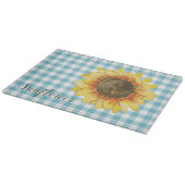 Zonnebloem op blauwe geruite stof snijplank (Hoek)