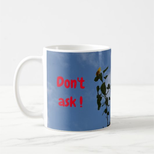 Zonnebloem op het dak. koffiemok (Links)