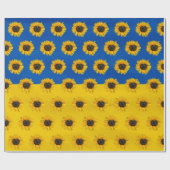 Zonnebloem van het hart op blauw en geel cadeaupapier (Vlak)