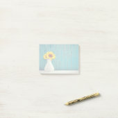 Zonnebloemen in een vaas post-it® notes (Op bureau)