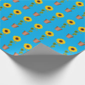 Zonnebloemen op blauw omslagpapier cadeaupapier (Hoek)