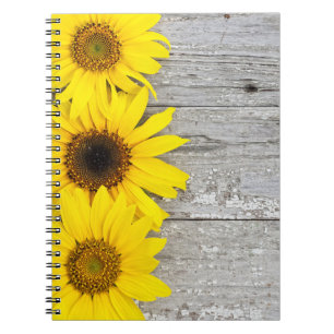 Zonnebloemen op een lijst notitieboek