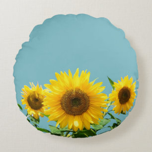 Zonnebloemen op licht teal turquoise rond kussen