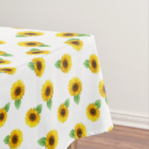 Zonnebloemen op wit tafelkleed
