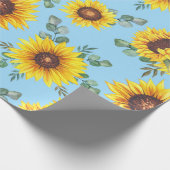 Zonnebloempatroon op blauwe achtergrond cadeaupapier (Hoek)
