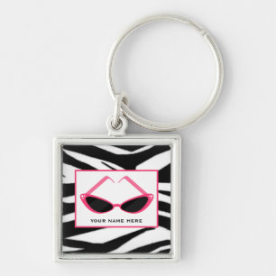 Zonnebrillen voor zebraafdrukken en roze retro sleutelhanger