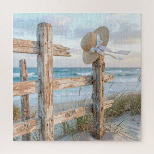 Zonnehoed op roestige strandhekpaal legpuzzel