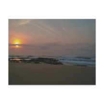 Zonneopgang over een rockpool aan de zijkant