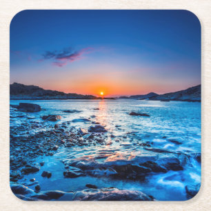 Zonneoploop over de horizon in Seashore op zonsopg Kartonnen Onderzetters