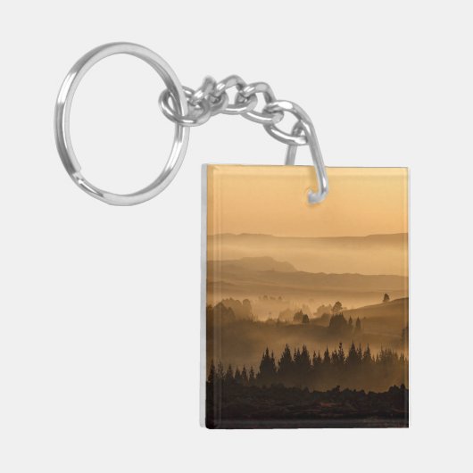 Zonneoploop over het landschap van Misty Rolling H Sleutelhanger (Voorkant Links)