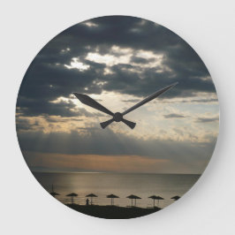 Zonneoppas over het strand in Griekenland - Schild Grote Klok