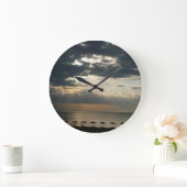 Zonneoppas over het strand in Griekenland - Schild Grote Klok (Huis)