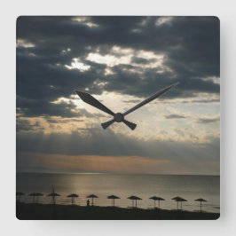Zonneoppas over het strand in Griekenland - Schild Grote Klok