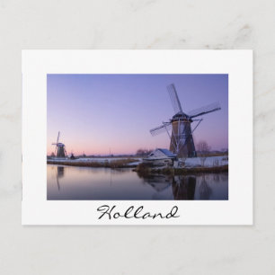 Zonneopstand boven de briefkaart Kinderdijk