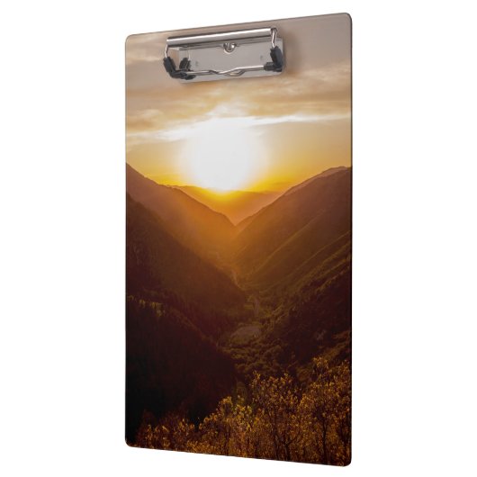 Zonneover berglandschap klembord (Links)