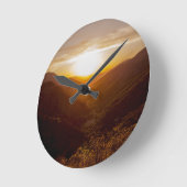 Zonneover berglandschap ronde klok (Hoek)