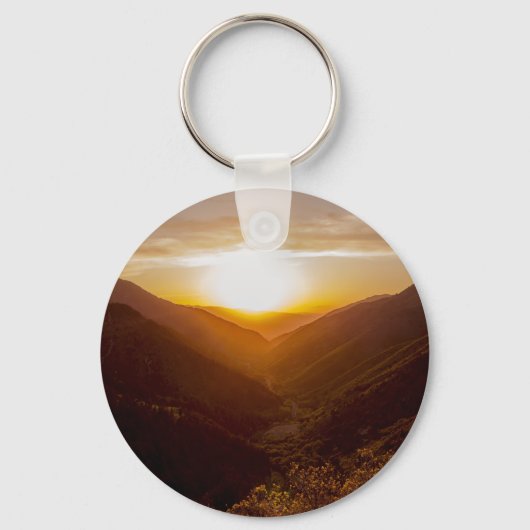Zonneover berglandschap sleutelhanger (Voorkant)
