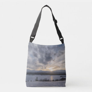 Zonneover bevroren meer crossbody tas