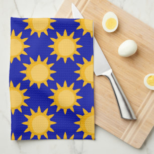 Zonnepatroonontwerp op blauw theedoek