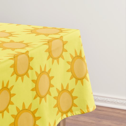 Zonnepatroonontwerp op geel tafelkleed (Voorbeeld)