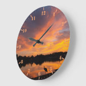 Zonnereflectie en zandkraansilhouet grote klok (Hoek)