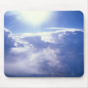 Zonneschacht door wolken muismat