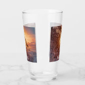 Zonnesten boven zee en snowpiene glas (Links)