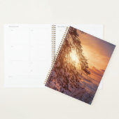 Zonnesten boven zee en snowpiene planner (Display)