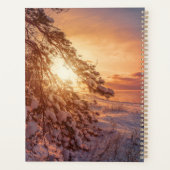 Zonnesten boven zee en snowpiene planner (Achterkant)