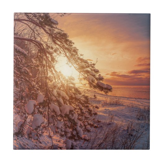 Zonnesten boven zee en snowpiene tegeltje (Voorkant)
