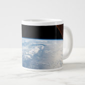 zonnestraal voor de kust van de stille oceaan grote koffiekop (Voorkant rechts)