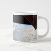 zonnestraal voor de kust van de stille oceaan grote koffiekop (Rechts)