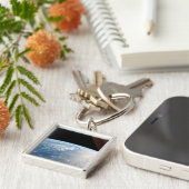 zonnestraal voor de kust van de stille oceaan sleutelhanger (Zijkant)