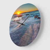 Zonnestralen verlichten de Stille Oceaan Grote Klok (Hoek)