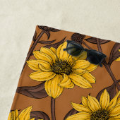 Zonnewortel, wilde zonnebloem in geel en bruin strandlaken (In situ)