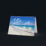 Zonnig strand met 2 stoelen Kerst Kaart<br><div class="desc">Warme kerstwensen vanaf het strand! Een prachtig zonnig strand met oceaangolven die langs het zand neerstorten. Er zijn 2 hoge rug witte strandstoelen met uitzicht op de oceaan. Hallo Aan de voorzijde staat "Kerst". Bekijk de vele design & stijlen in onze winkel.</div>