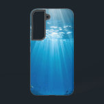 Zonovergoten koraalrif stoere telefoonhoes samsung galaxy hoesje<br><div class="desc">Duik in de adembenemende schoonheid van een zonovergoten onderwaterwereld elke keer dat je je telefoon opneemt. Deze prachtige telefoonhoes heeft een levendig afbeelding van schitterende zonnestralen die door helder blauw water steken en een bloeiend koraalrif vol kleurrijke vissen verlichten. Het unieke uitzicht naar boven met een glimp van bomen creëer...</div>