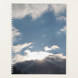 Zonovergoten luchtplanner, wolken en zon planner