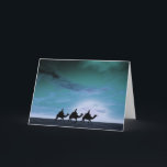 Zonsondergang 3 van drie Koningen Feestdagen Kaart<br><div class="desc">Een mooie Kerstkaart die de drie koningen op kamelen afschilderen,  die door de woestijn tegen een dramatische hemel in koude blauw reizen en cyaan.</div>