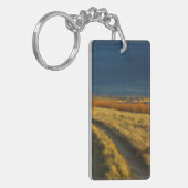 Zonsondergang accentueert de rode bast van struike sleutelhanger (Voorkant Links)