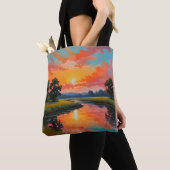 Zonsondergang bij de rivier tote bag (Dichtbij)