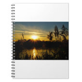Zonsondergang bij een meertje met rietpluimen. notitieboek (Voorkant)