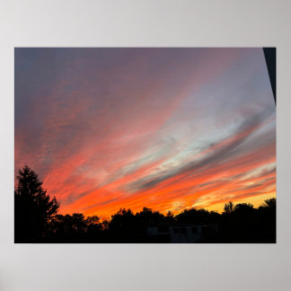 Zonsondergang boven een veld poster