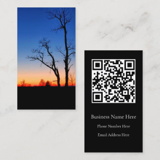 Zonsondergang door de bomen visitekaartje