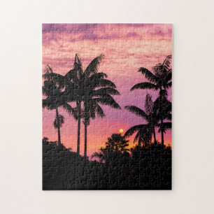 Zonsondergang door palmbomen legpuzzel