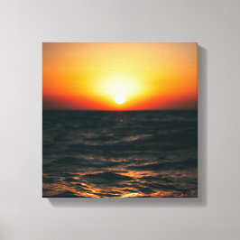 Zonsondergang op het strand op canvas afdruk