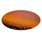 Zonsondergang over de stad snijplank (Hoek)