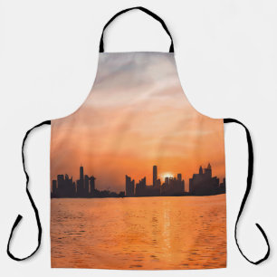 Zonsondergang over een kuststad - aquarel schort