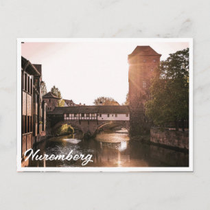 Zonsondergang over middeleeuwse brug in Neurenberg Briefkaart