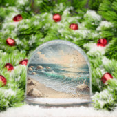 Zonsondergang over oceaangolven en rotsachtige kus sneeuwbol (Kerstmis)